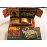 Vintage Boxed with inner stand Corgi James Bond Car in an very good + condition.