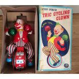 Vintage Japanese Modern Toys Boxed Battery Operated Tric Cycling Clown.