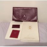 Cartier Red leather clutch bag/wallet 11" x6" C1980’s from the Les Must Range with boox and Cards.