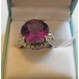 9ct Gold and Amethyst Ring with stone of 14mm diameter - total weight 7.20 grams.