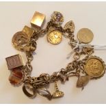 Vintage 9ct Gold Charm Bracelet to include Half Sovereign - 55 grams total weight.
