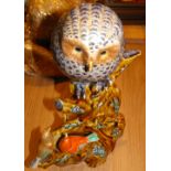 An Oriental Owl and Birds China Group standing 13" tall and 8 1/2" at the widest.