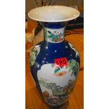 A antique Oriental Vase standing 18" tall and 8" at the widest.