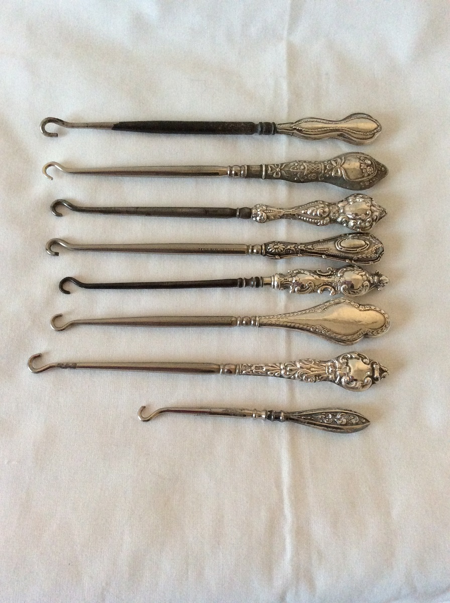 Lot of 8 Vintage Silver Handled Button Hooks.