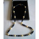 14 karat Gold Oriental 24 inch Cultuured Freshwater Pearl&Onyx Necklace with Black&Golden Pearls