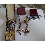 1938-1945 Cross of Honour of the German Mother in gold, silver and bronze & plus miniatures.