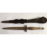 Vintage World War 11 Wilkinson Sword Fighting Knife in Sheath - 11 5/8" long.
