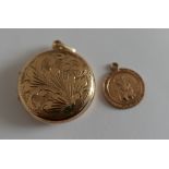 Vintage 9 karat Gold Locket (29mm diameter) and 9 karat Gold St Christopher - weight approx 9.85 g