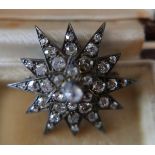 Antique Gold and Diamond 12 Star Point Brooch - 33mm diameter set with 37 diamonds.