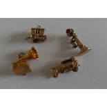 Lot of Vintage 9 karat Gold Charms - total weight approx 14.2 grams.