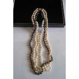 14 karat Gold Oriental 17 inch Triple Row Set of Cultured Pearl Pearls.