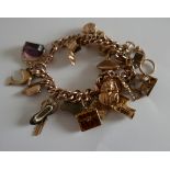Vintage 9 karat Gold Charm Bracelet approx 46.4 grams.
