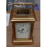 Miniature Brass Carriage Clock - 3" x 1 5/8" x 1 3/4" - working order.