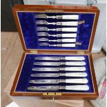 Vintage Boxed Set of Mother of Pearl Handled Knives and Forks with Silver Collars.
