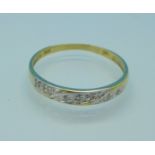 A 9ct gold and diamond ring, 0.