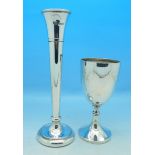 A silver vase with weighted base and goblet,