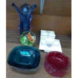 A Poole trinket box and Poole ashtray, a large glass paperweight,