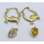 A pair of 9ct gold dolphin earrings,