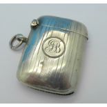 A silver vesta case with initials, Birmingham 1915,