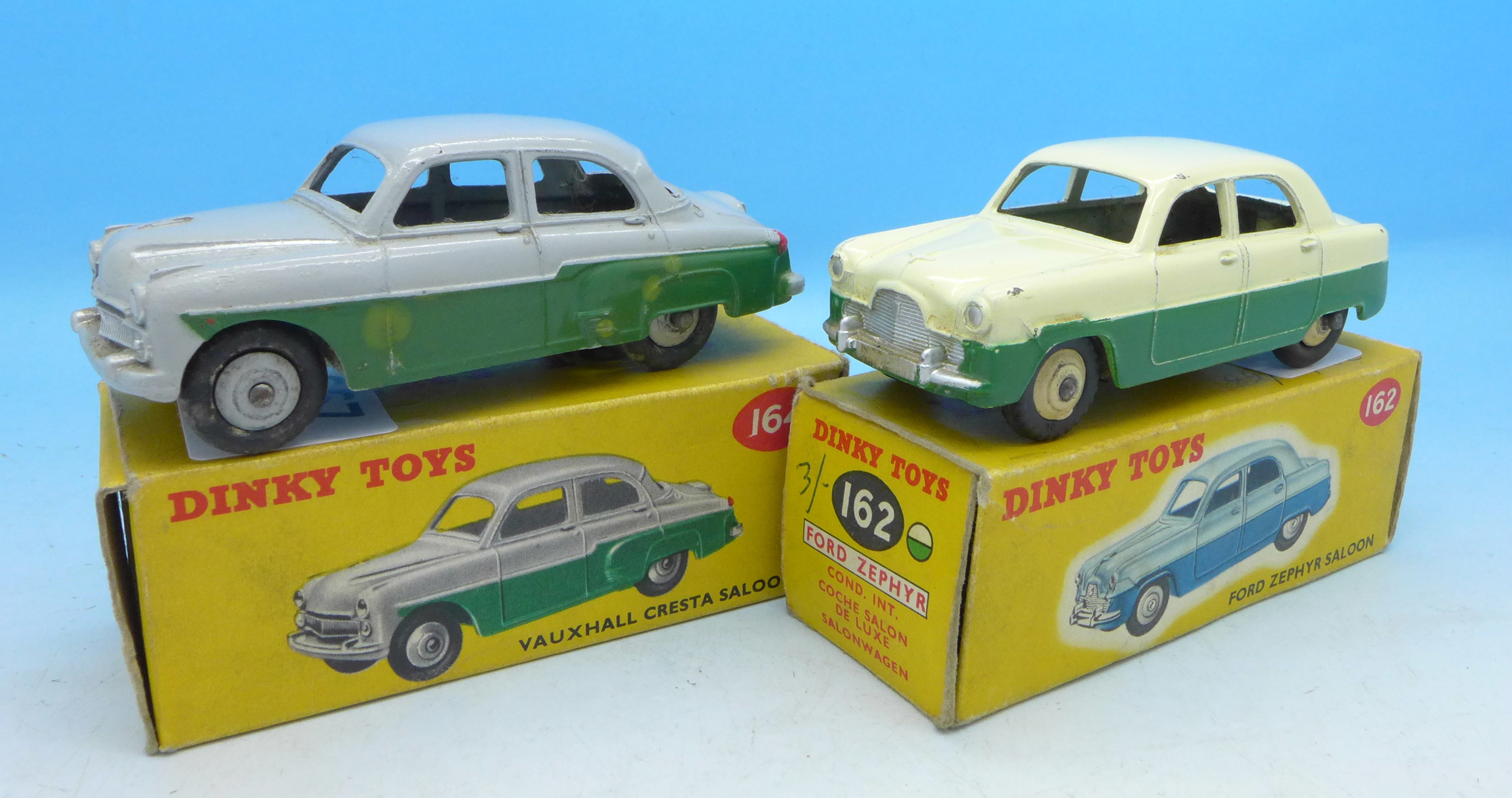 Two Dinky Toys die-cast vehicles, 162 and 164,