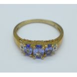 A 9ct gold, blue stone and diamond ring, 2.
