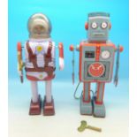 Two clockwork robots, Earth Man and Robot,