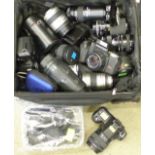 A collection of cameras, camera bodies and lenses, etc.