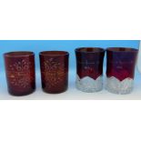 Two pairs of ruby glass mugs,