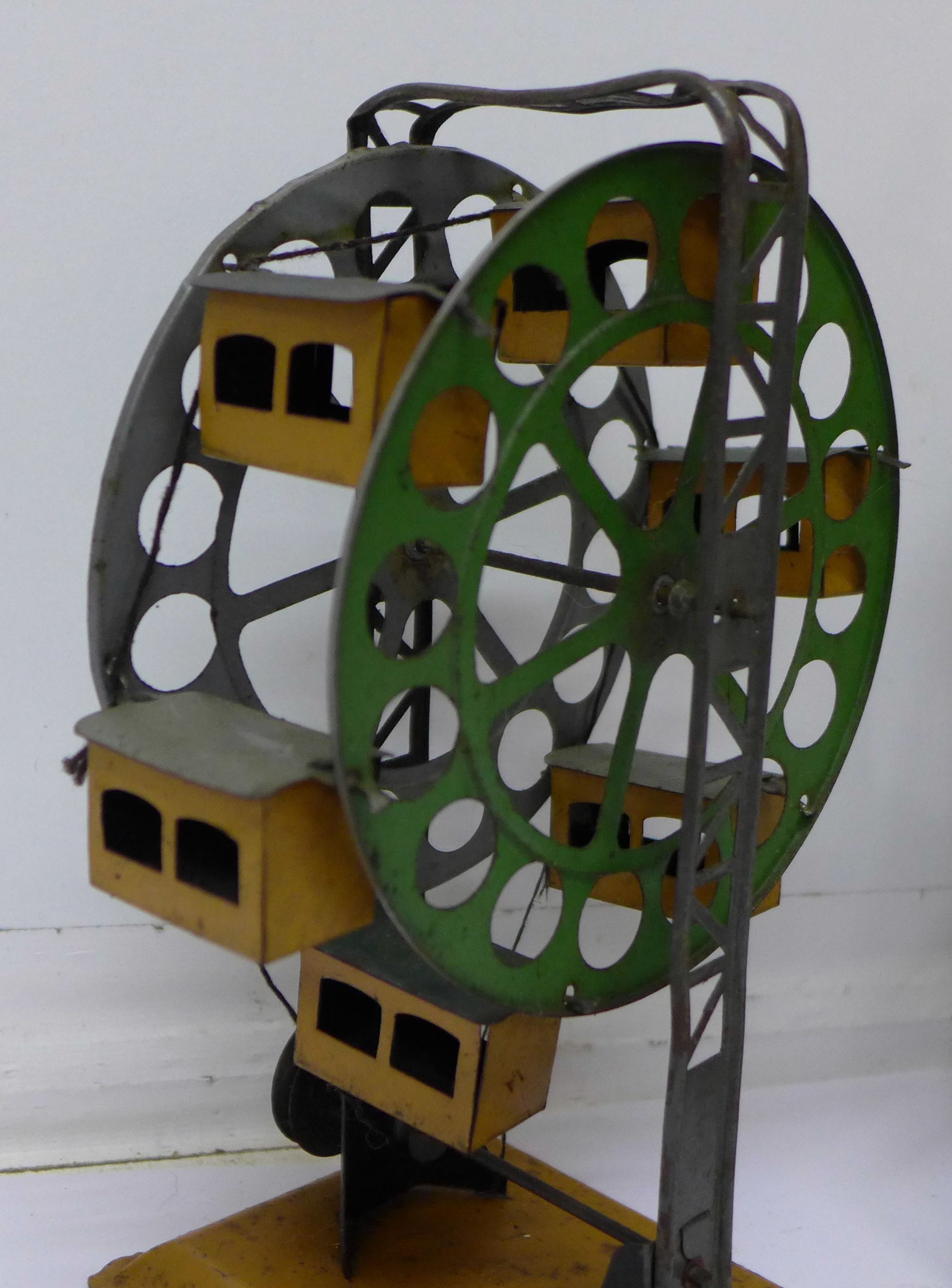 A pre-war German tin plate ferris wheel and a German fairground ride, - Image 2 of 4