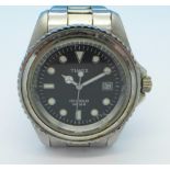 A Timex Indiglo wristwatch, WR50M,