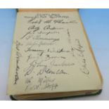 An autograph album containing many football teams from the 1930's on single pages,