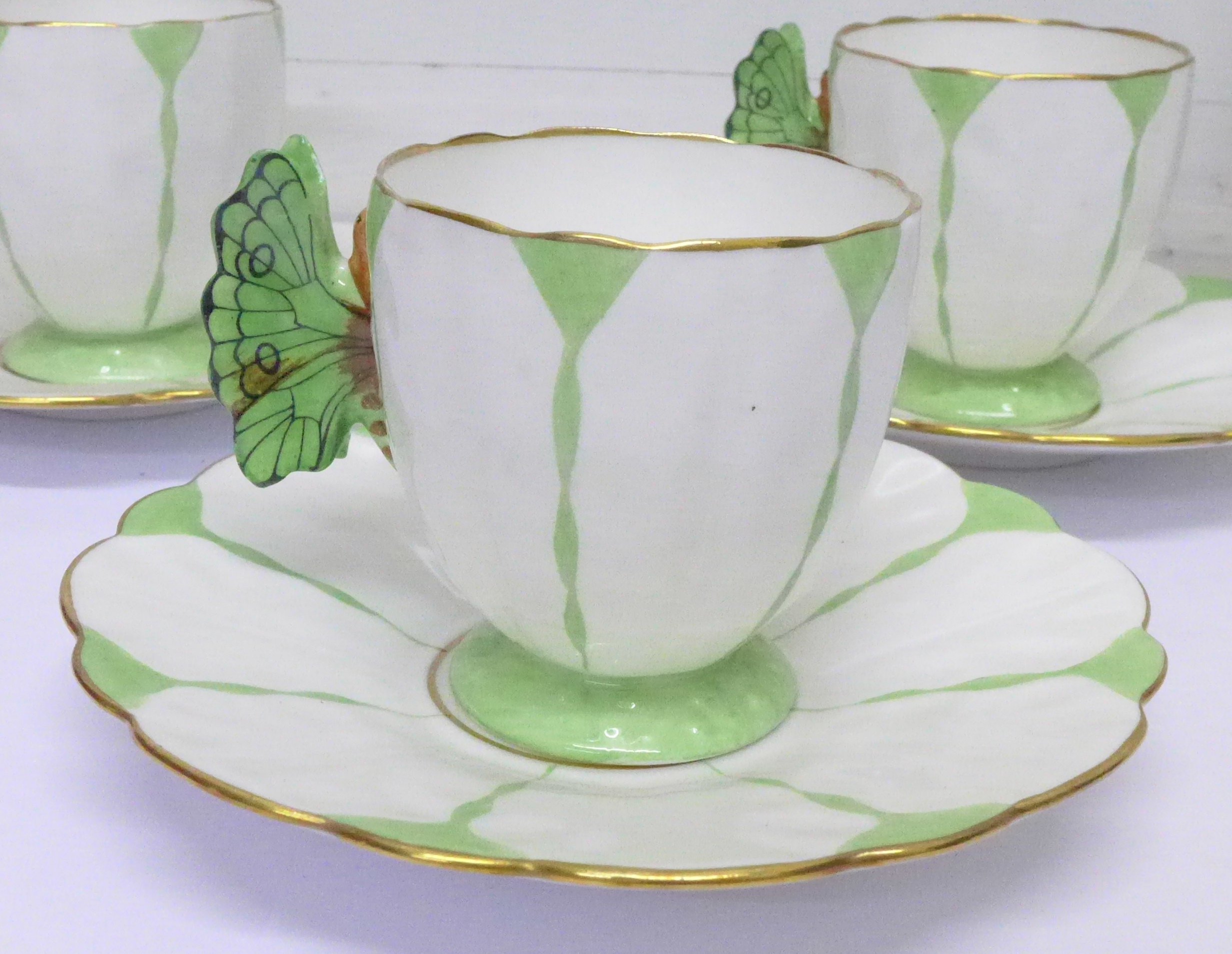 A rare Aynsley Green Harlequin Art Deco butterfly handle six setting coffee set, - Image 6 of 15