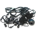 Three black bead necklaces