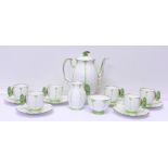 A rare Aynsley Green Harlequin Art Deco butterfly handle six setting coffee set,