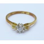 A yellow metal and diamond ring, 3.