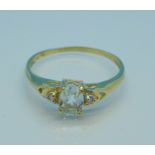 A 9ct gold, blue stone and diamond ring, 1g,