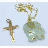 A 9ct gold crucifix and a yellow metal mounted pendant on a 9ct gold chain, weight of cross 1.