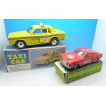 Two 1960's/1970's tin plate vehicles, battery operated taxi cab and friction metal rally car,