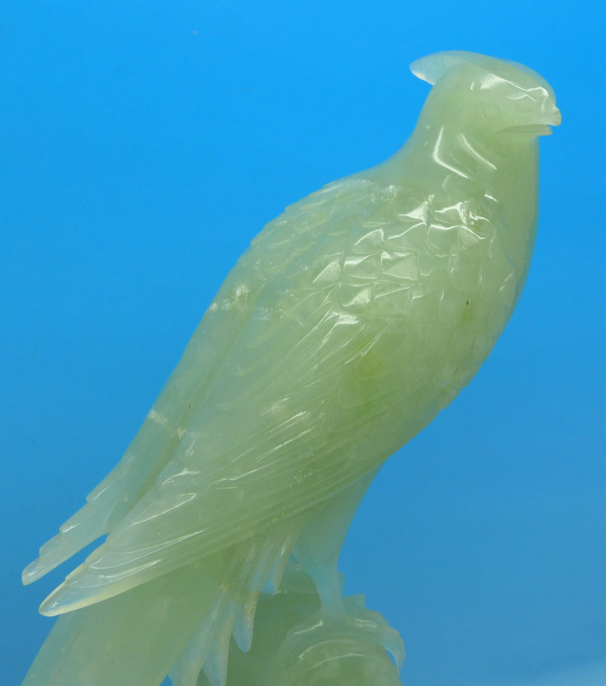 A carved jade model of a bird of paradise on a carved wooden stand, beak a/f, - Image 2 of 3