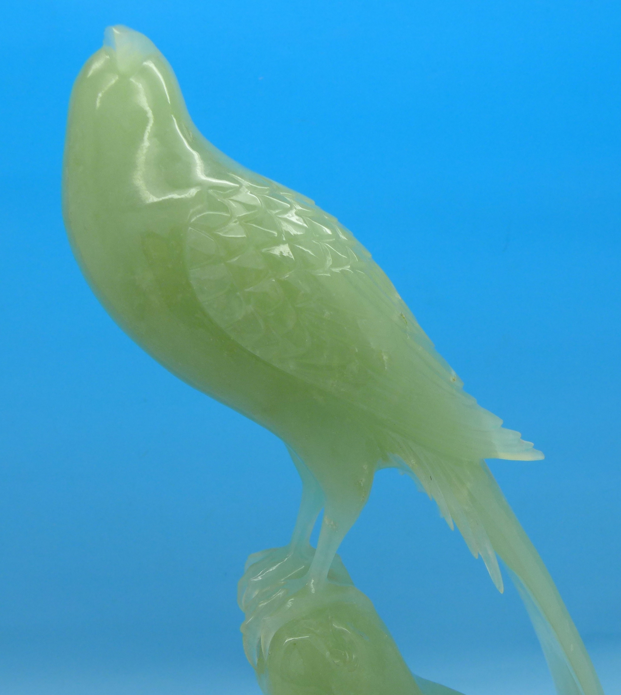 A carved jade model of a bird of paradise on a carved wooden stand, beak a/f, - Image 3 of 3