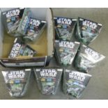 Ten Topps Star Wars candy containers with collector cards,