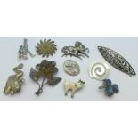 Ten silver and white metal brooches