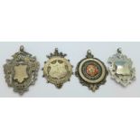 Four silver fobs, including one Northants Football Association,