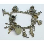 A white metal charm bracelet,