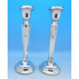 A pair of silver candlesticks, Birmingham 1975, 18.