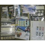 Twenty-five Royal Mail mint stamp packs,