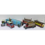 Six tin plate vehicles; two trolley buses, two French motor cars,