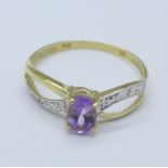 A 9ct gold, amethyst and diamond ring, 0.