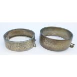 Two silver bangles,