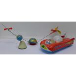 A German tin plate globe and airplane toy,